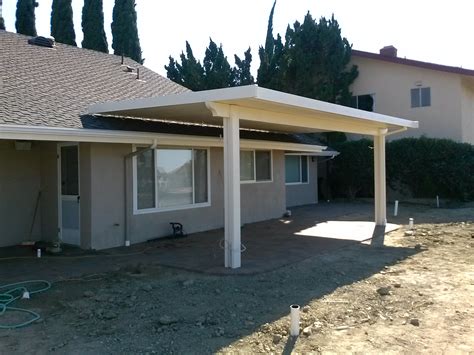 how to attach a metal patio roof to house|attaching roof to house.